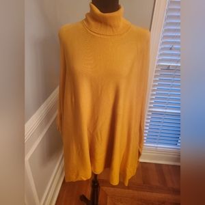 Pretty Ladies Gold Alfani poncho sweater with accent buttons on sleeve